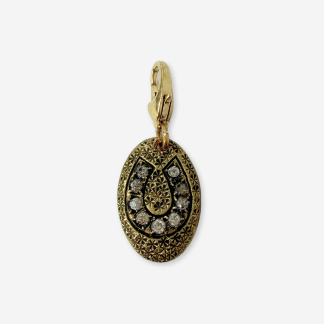 Vintage antique gold and clear rhinestone oval horseshoe charm