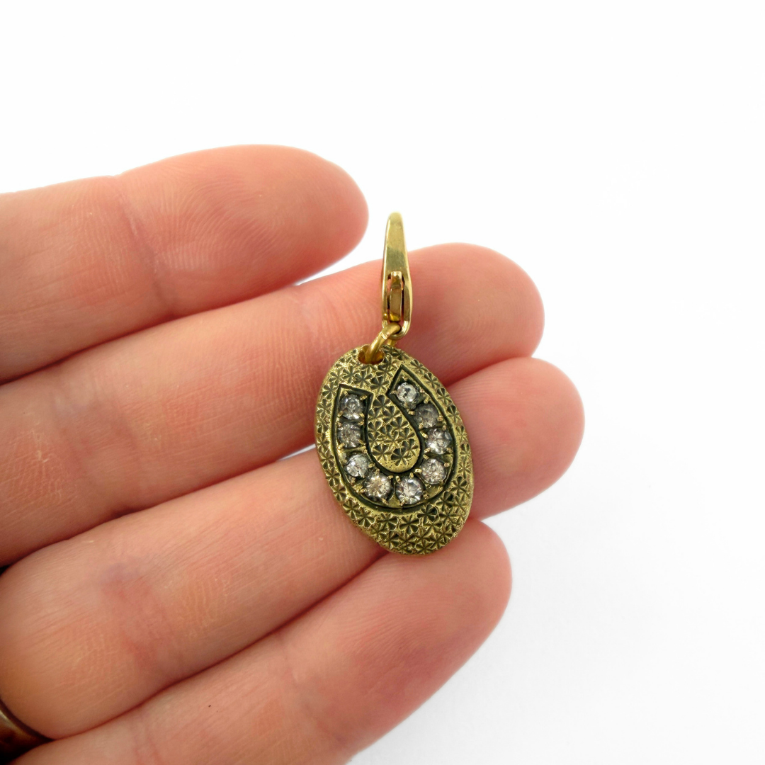 Vintage antique gold and clear rhinestone oval horseshoe charm
