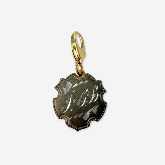 Ornate antique engraved silver monogram charm