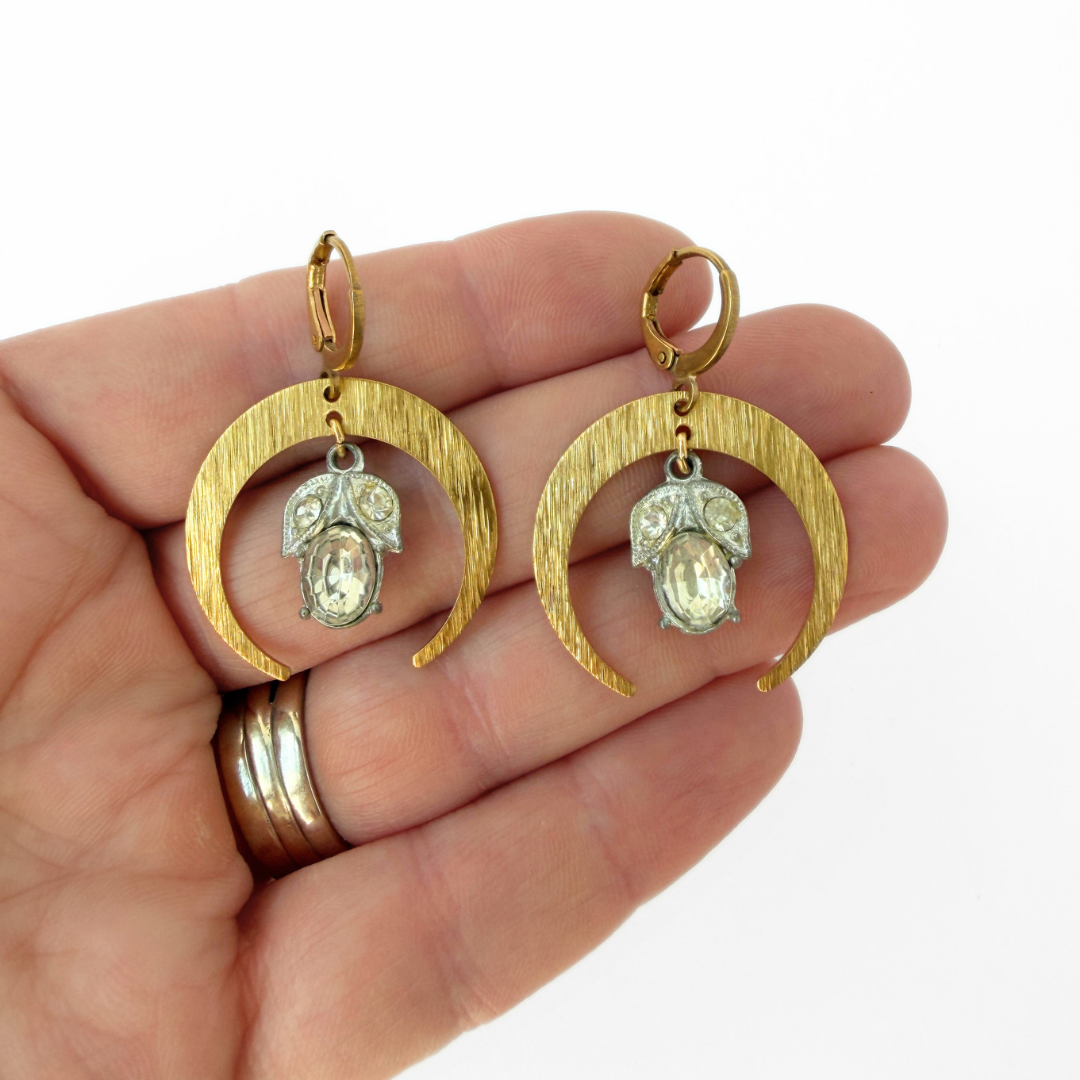Brass crescent hoop earrings with vintage clear rhinestone center drops