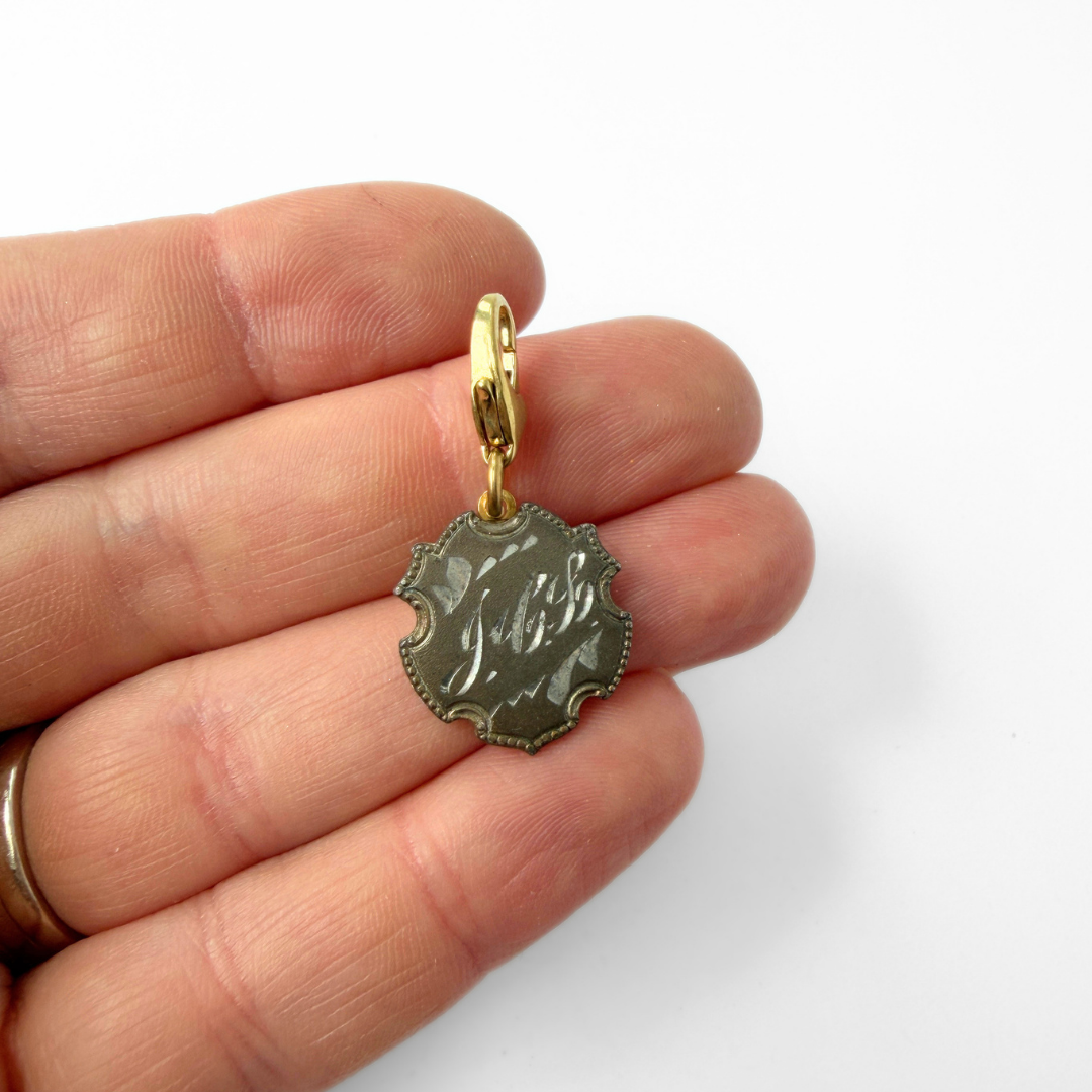 Ornate antique engraved silver monogram charm