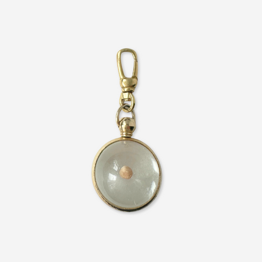 Vintage mustard seed transparent orb charm