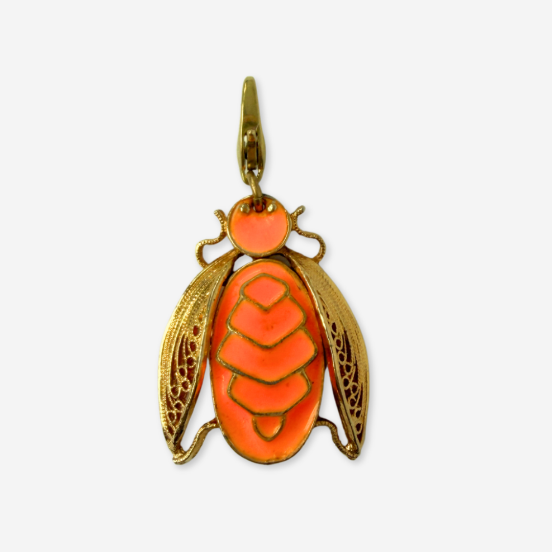 Large vintage gold and neon orange enamel insect charm