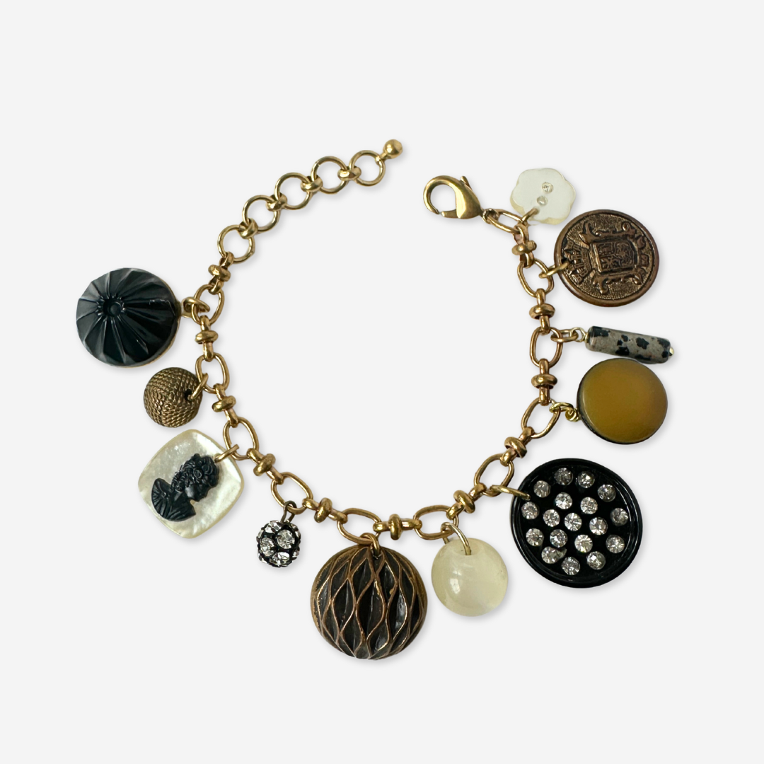 Repurposed vintage mixed charm bracelet