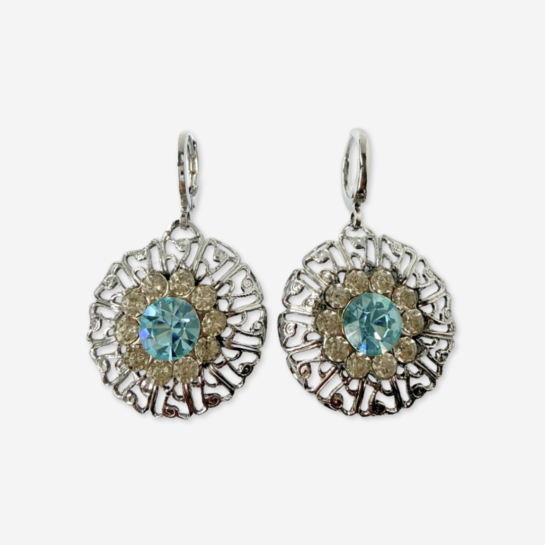 Refashioned vintage silver filigree earrings with aqua rhinestone center