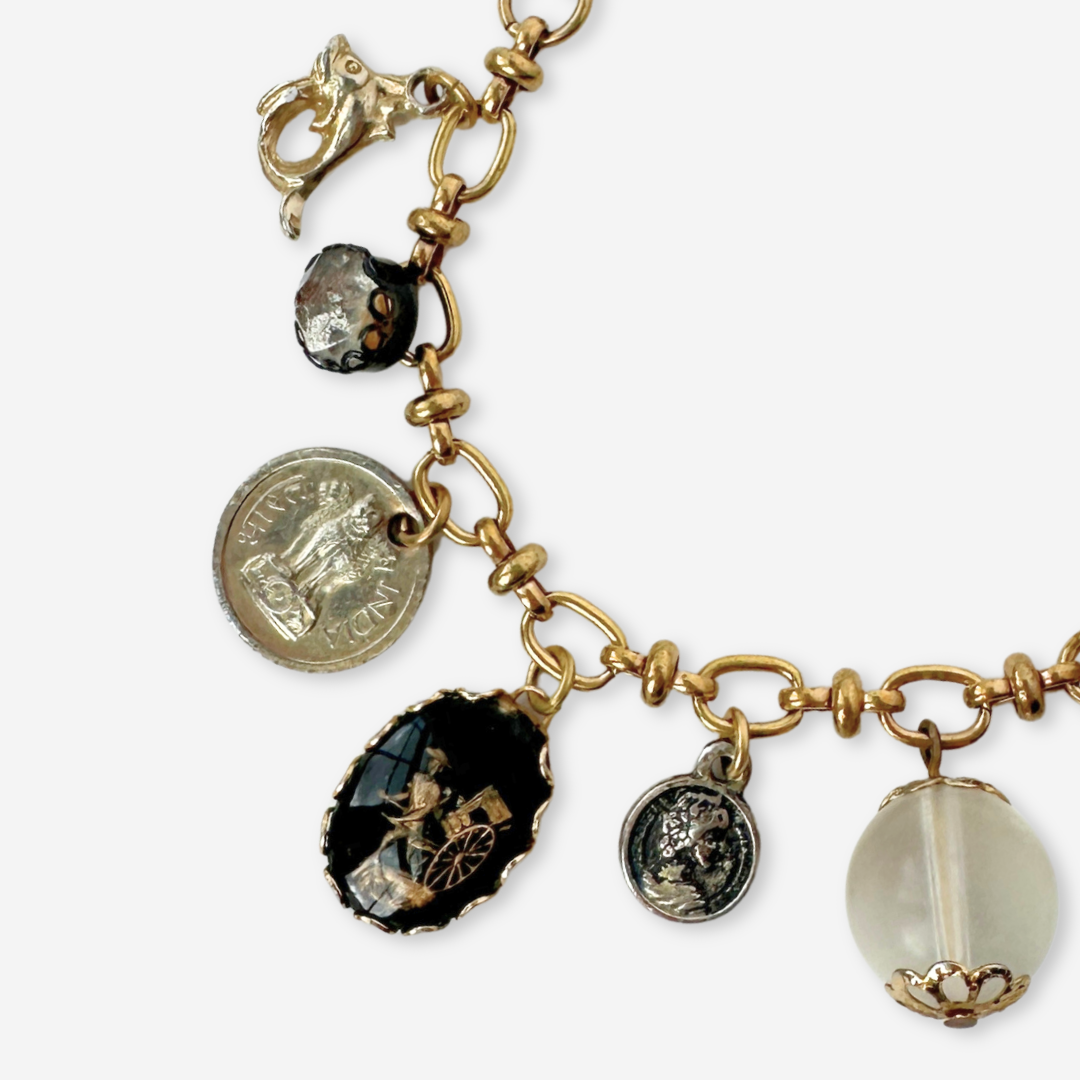 Repurposed vintage mixed metal charm bracelet