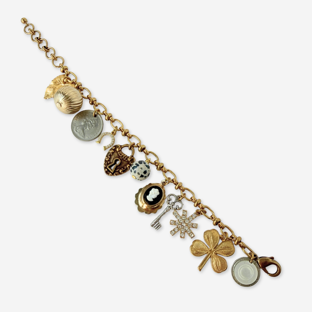 Repurposed vintage mixed neutral charm bracelet