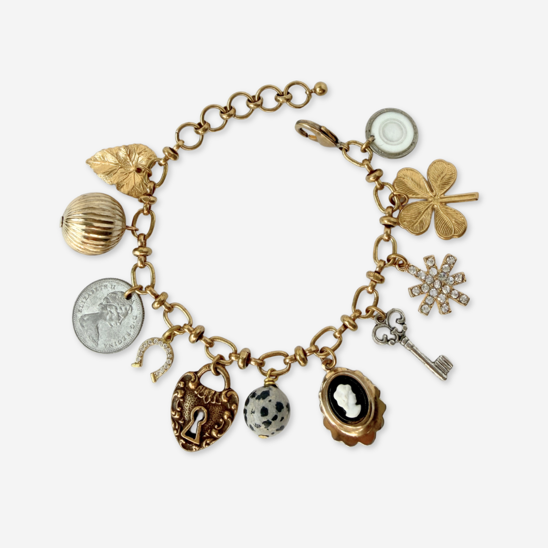 Repurposed vintage mixed neutral charm bracelet
