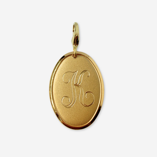 Vintage gold plated oval letter "K" monogram charm