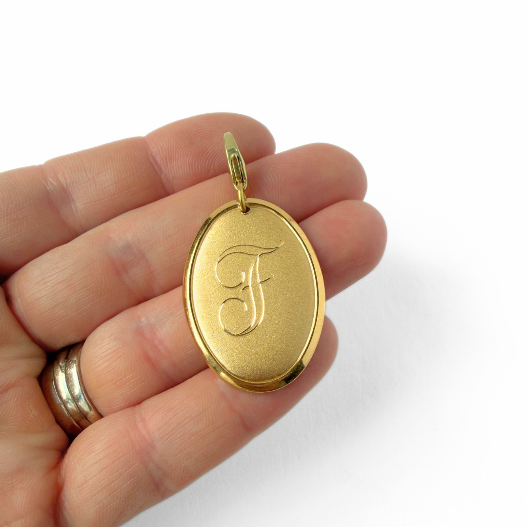Vintage gold plated oval letter "F" monogram charm