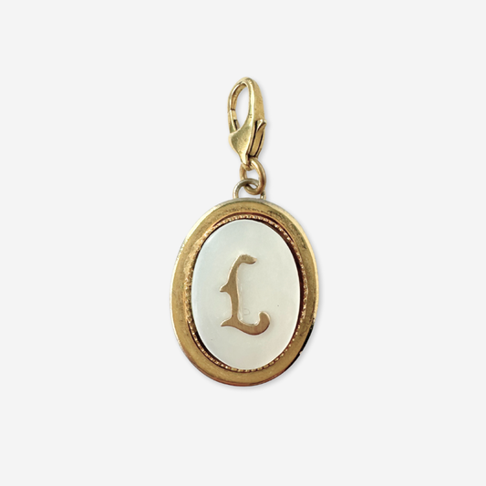 Vintage oval mother of pearl and gold "L" monogram charm