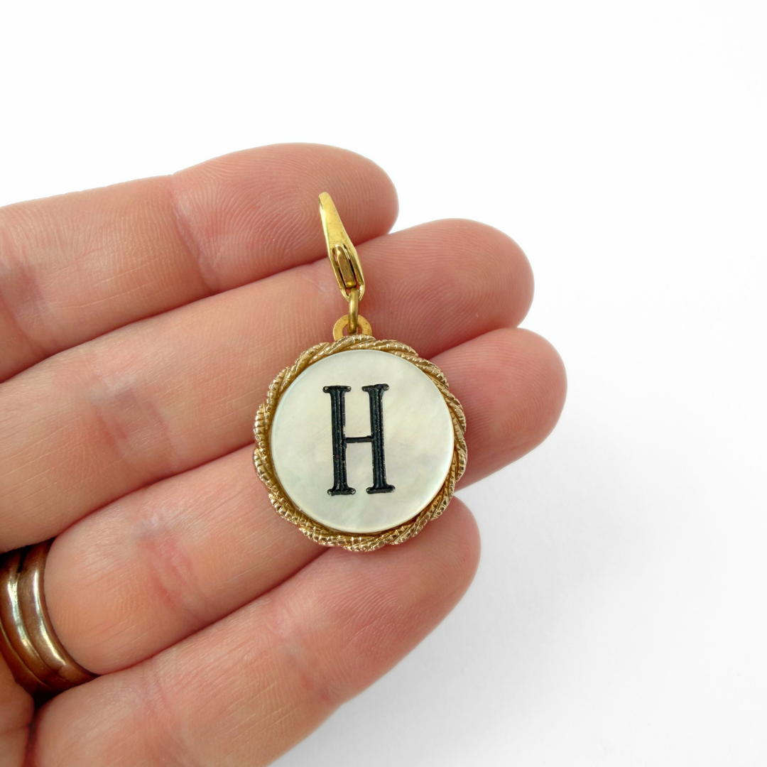 Refashioned vintage circular mother of pearl "H" monogram charm