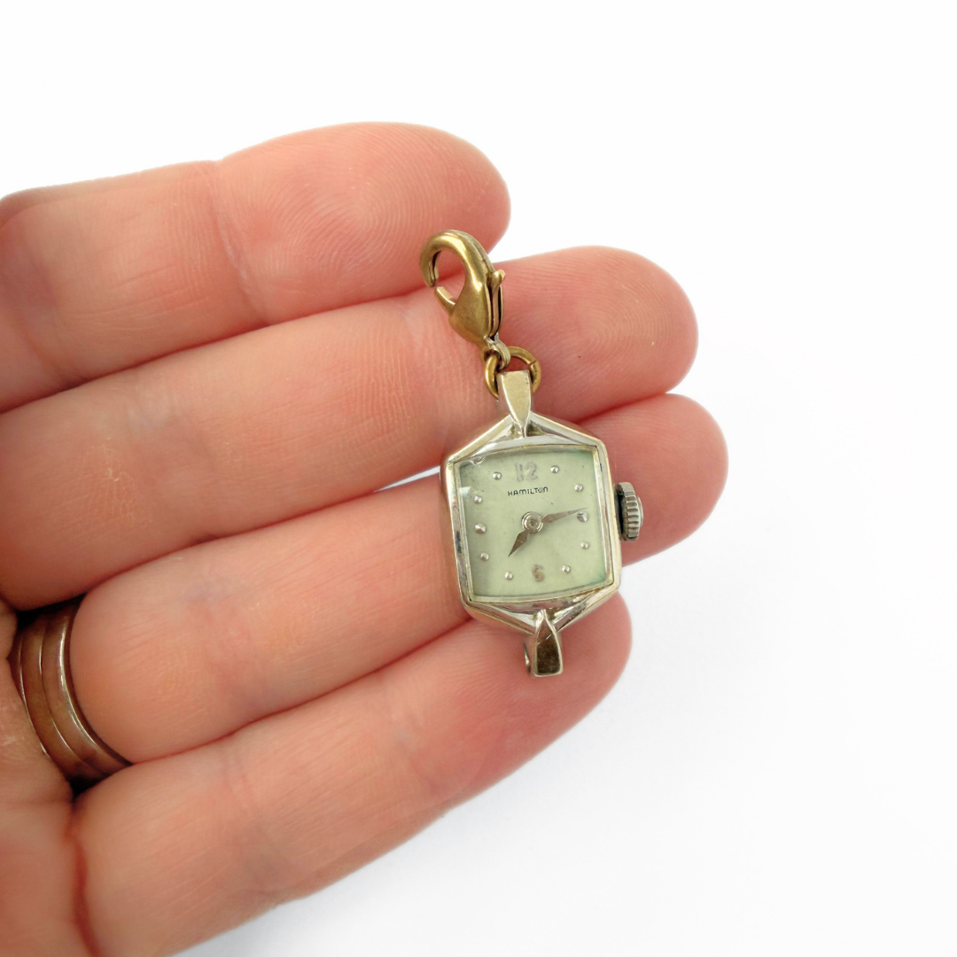 Vintage faded gold tone  "Hamilton" watch face charm