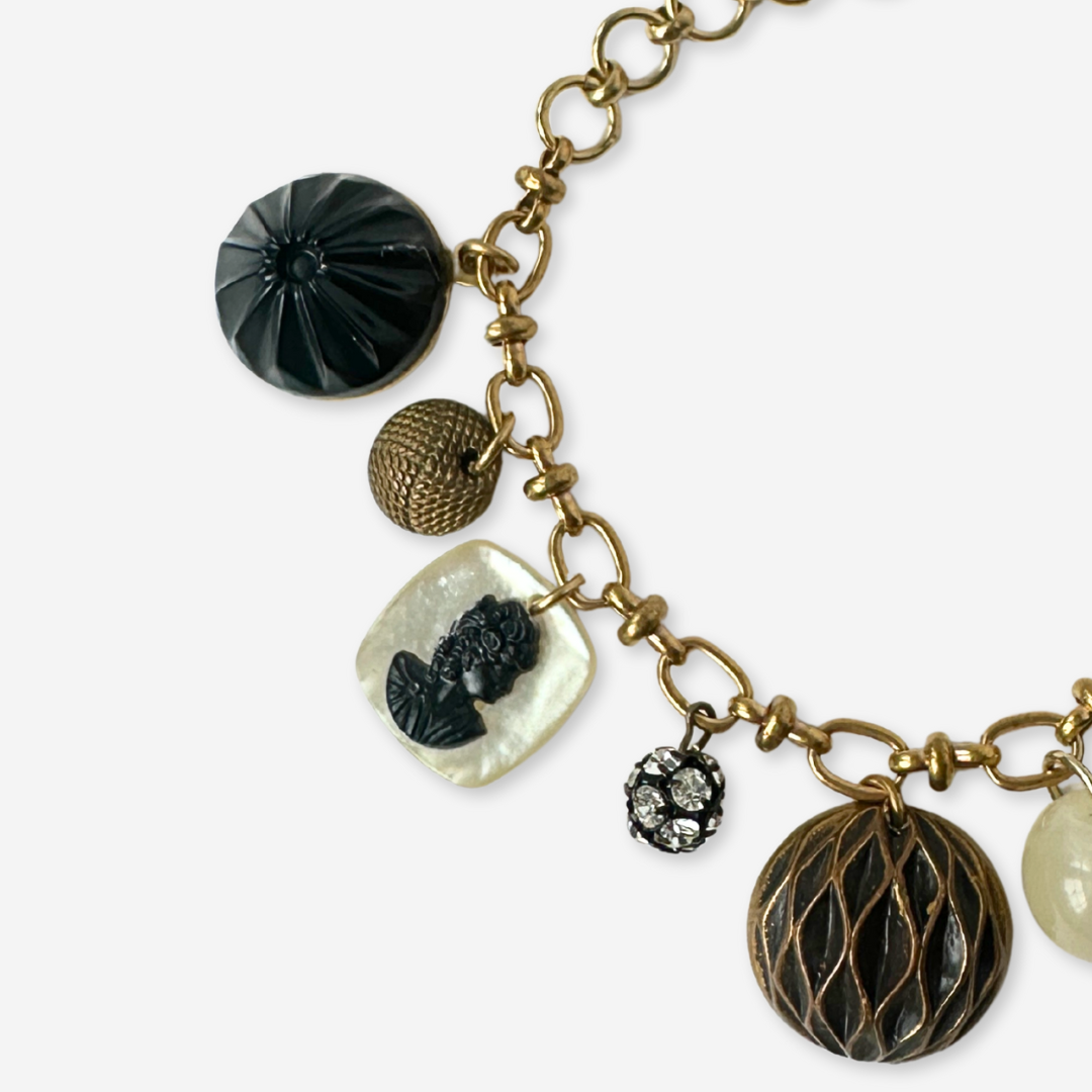 Repurposed vintage mixed charm bracelet