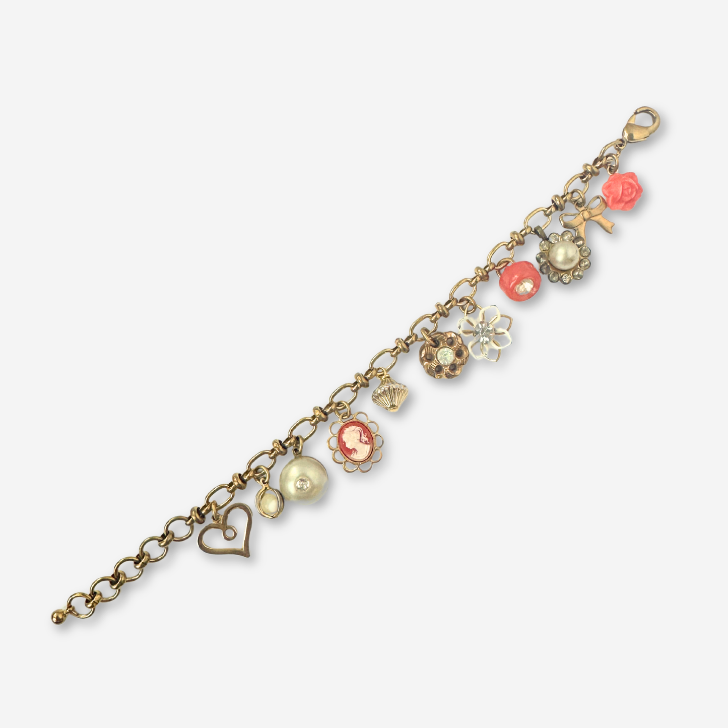 Repurposed vintage coral and brass charm bracelet