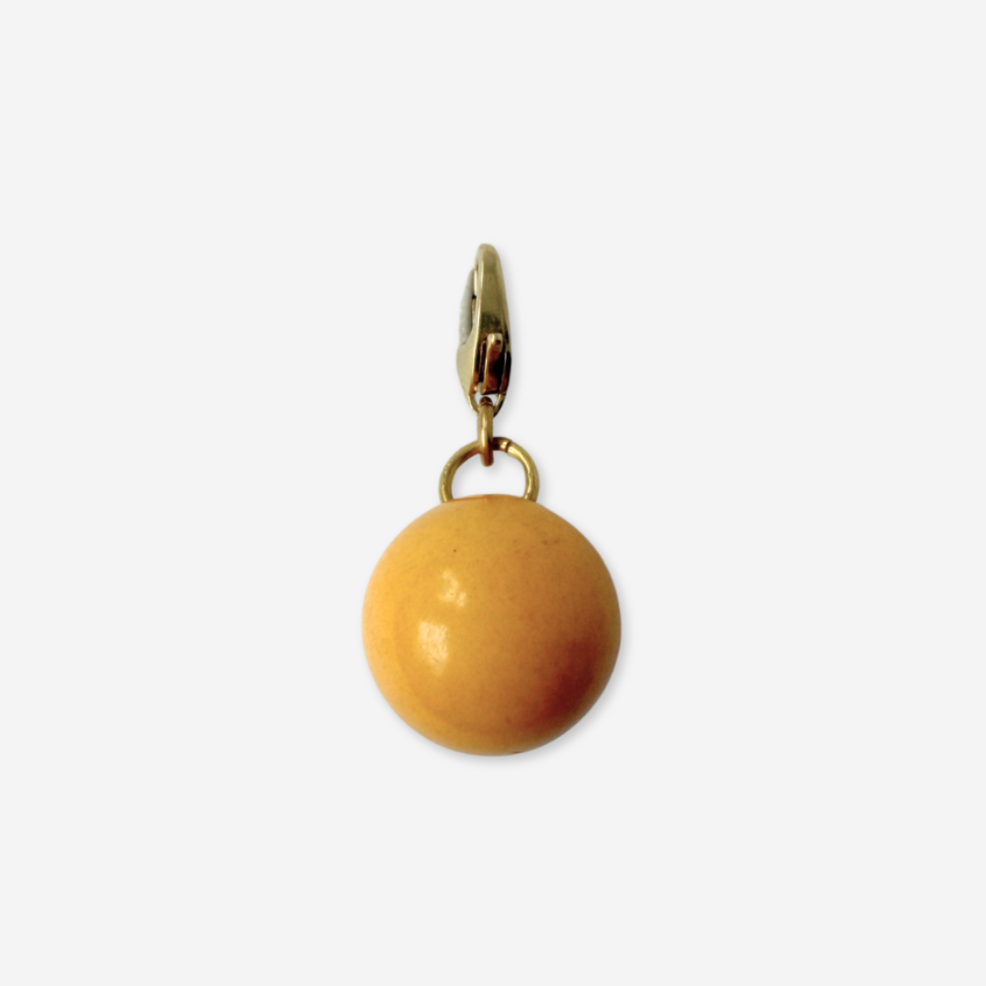 Vintage mustard yellow bakelite bead charm