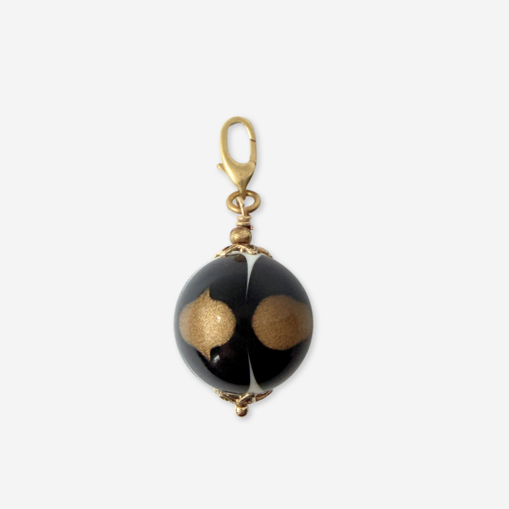 Vintage black, gold and white unique bead charm