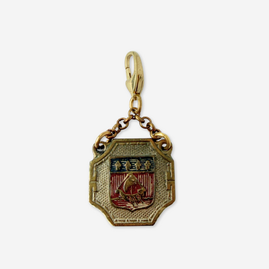 Vintage aged brass Parisian medal charm: Coat of Arms