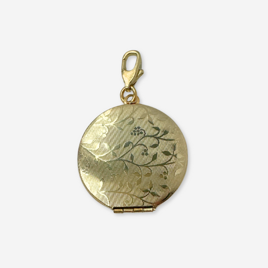 Vintage muted gold circular locket charm