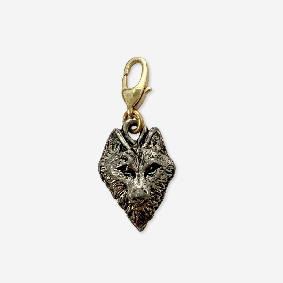 Small vintage silver wolf face charm