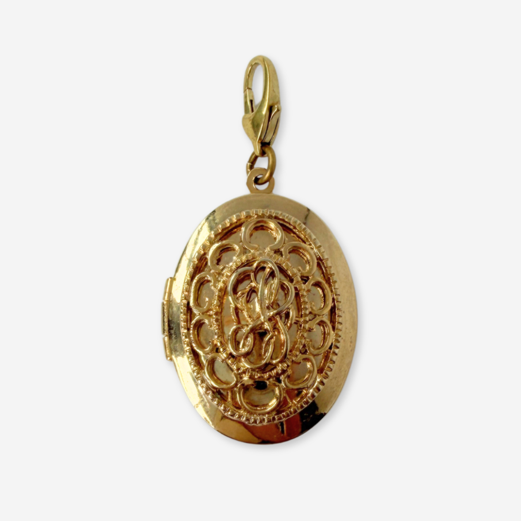 Vintage gold plated oval locket charm