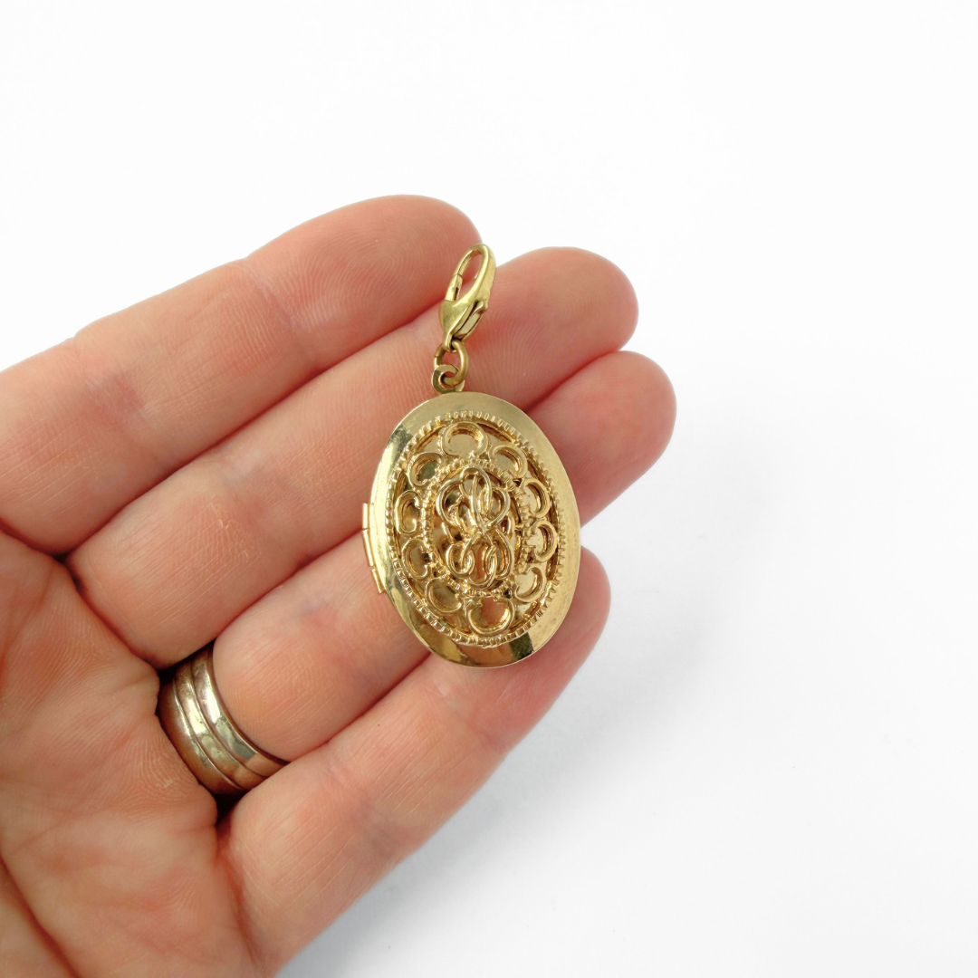 Vintage gold plated oval locket charm