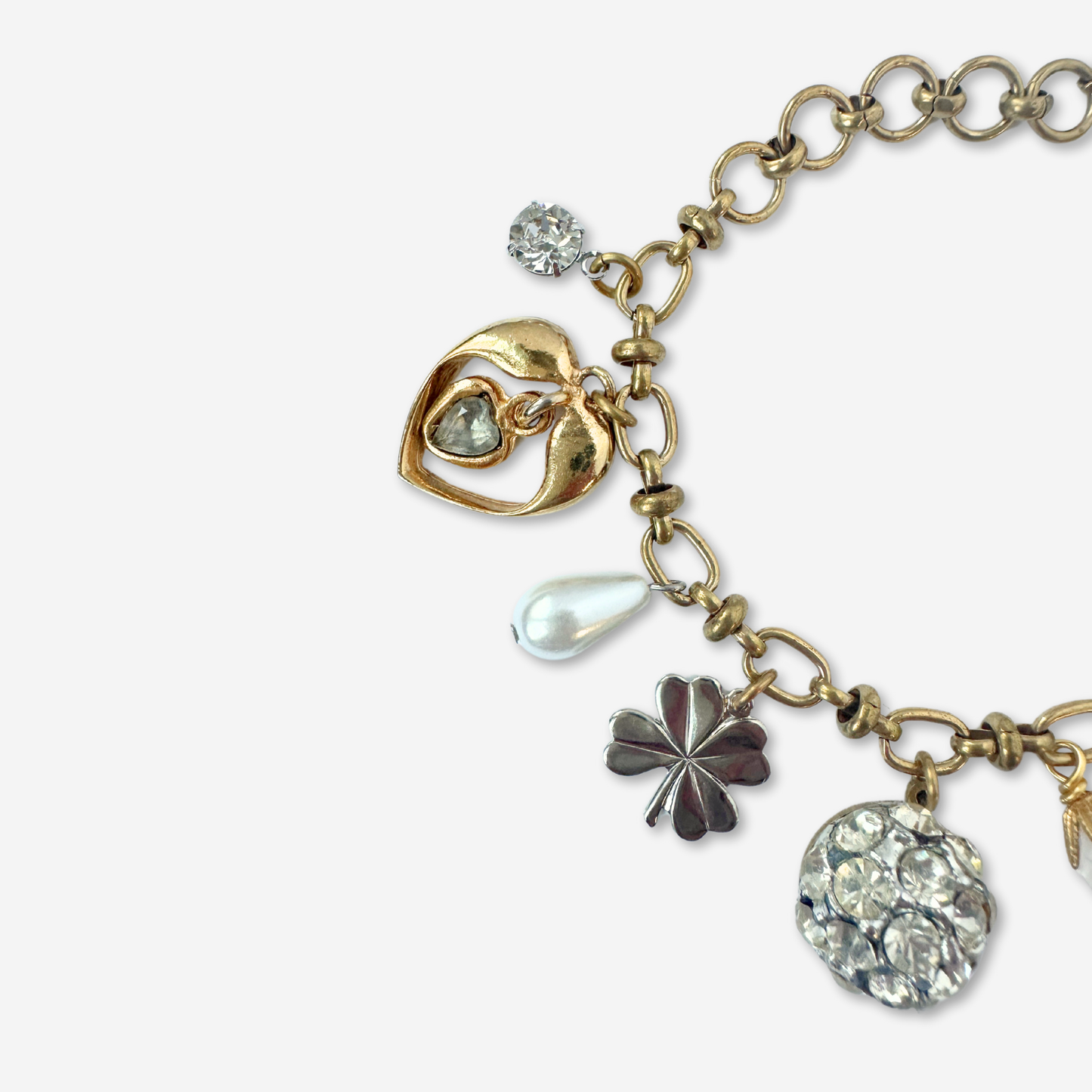 Repurposed vintage silver and brass good luck charm bracelet