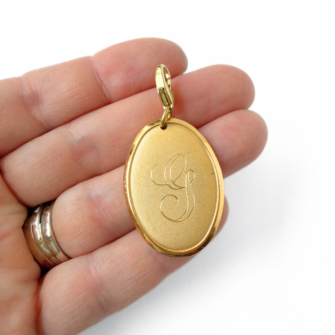Vintage gold plated oval letter "G" monogram charm