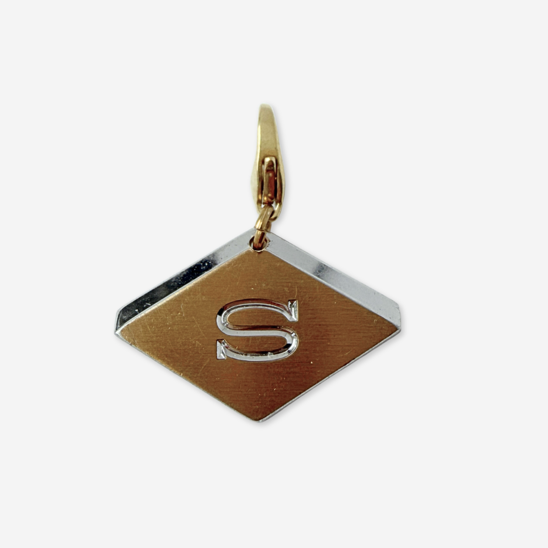 Vintage mixed metal diamond-shaped letter "S" monogram