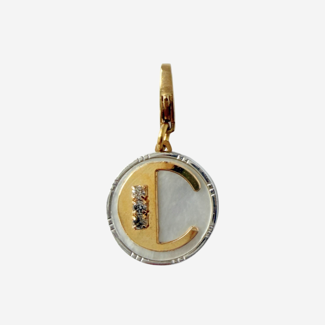 Vintage mixed metal and mother of pearl circular "C" monogram charm