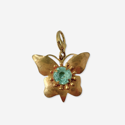 Vintage aged brass butterfly charm with aqua rhinestone