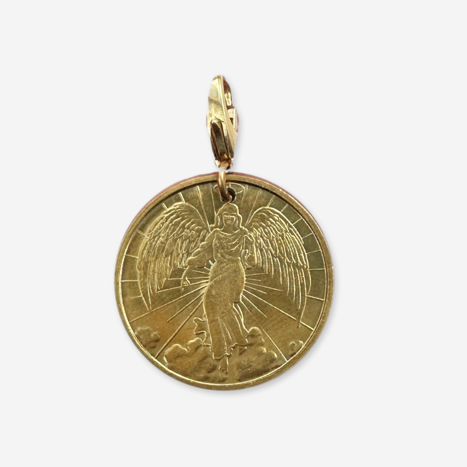 Gold pendant with an angel design on a white background