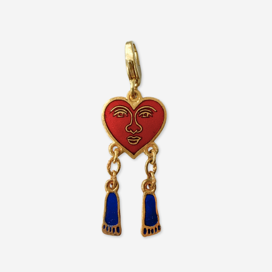 Vintage surrealist enamel heart and dangling feet charm