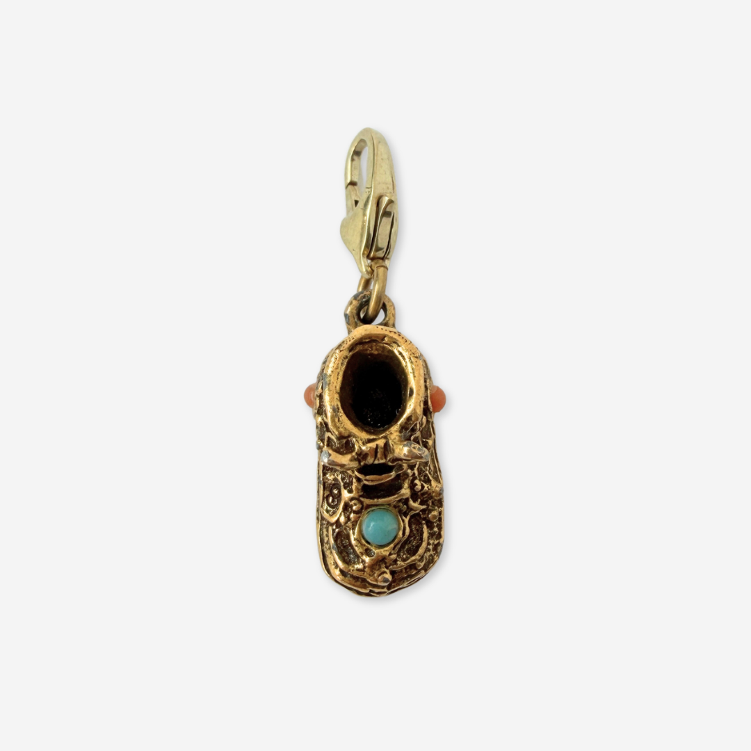 Vintage aged gold baby shoe charm with turquoise and coral stones