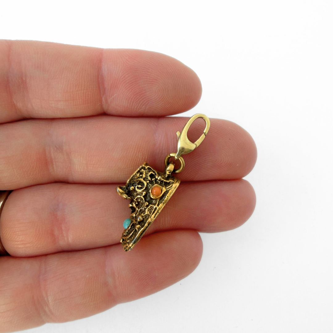 Vintage aged gold baby shoe charm with turquoise and coral stones