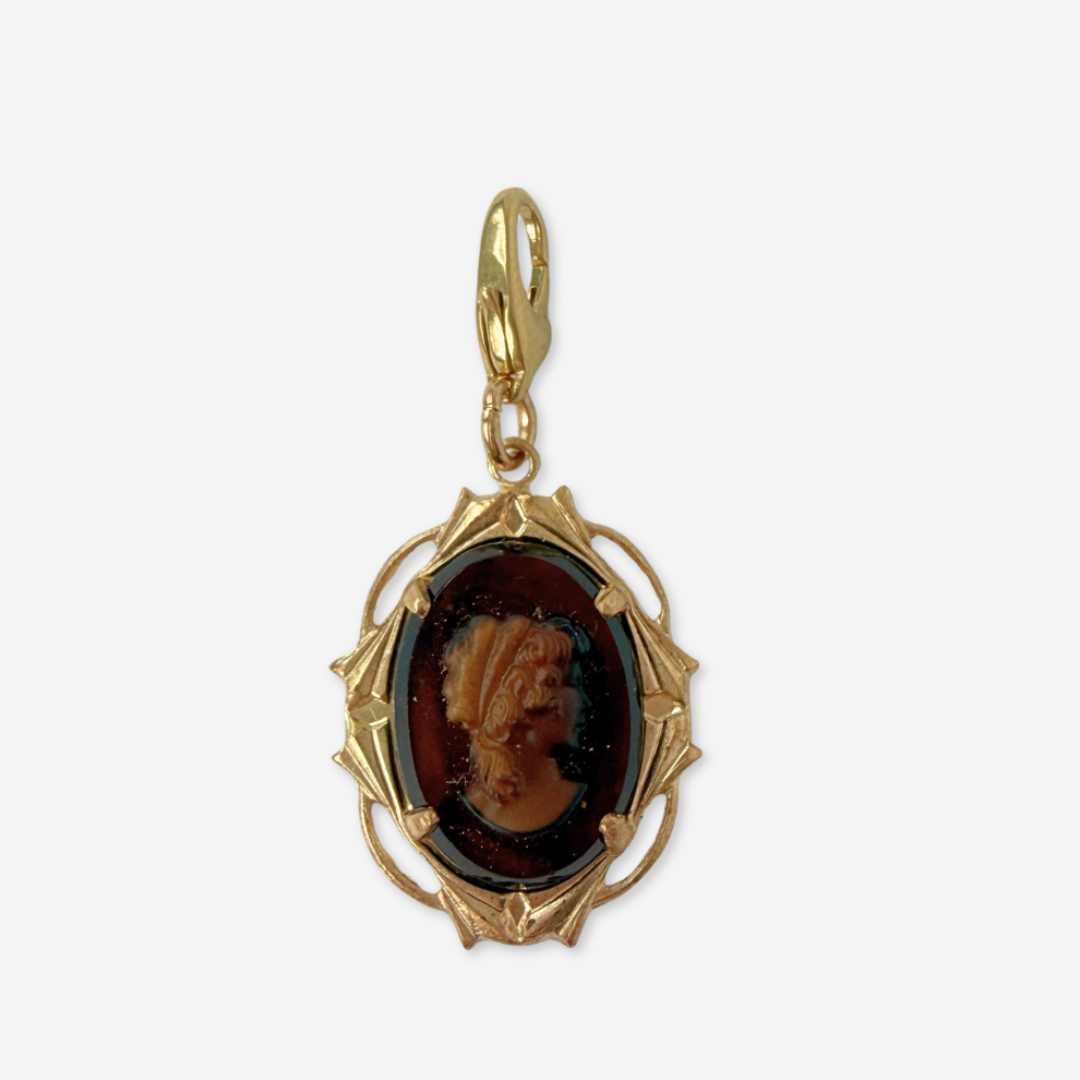 Vintage brown glass cameo charm with brass frame