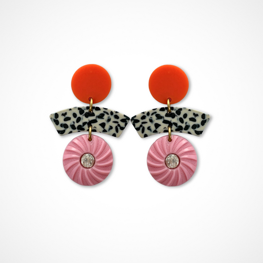 Repurposed pink and orange vintage button earrings with speckled black and cream arc