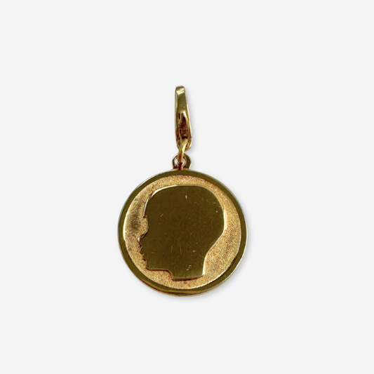 Vintage gold tone little boy silhouette circular charm