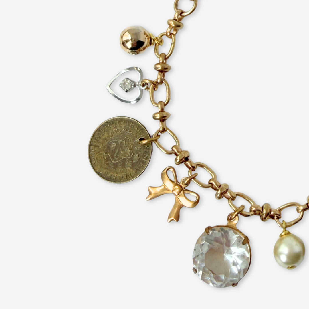 Repurposed vintage mixed neutral charm bracelet