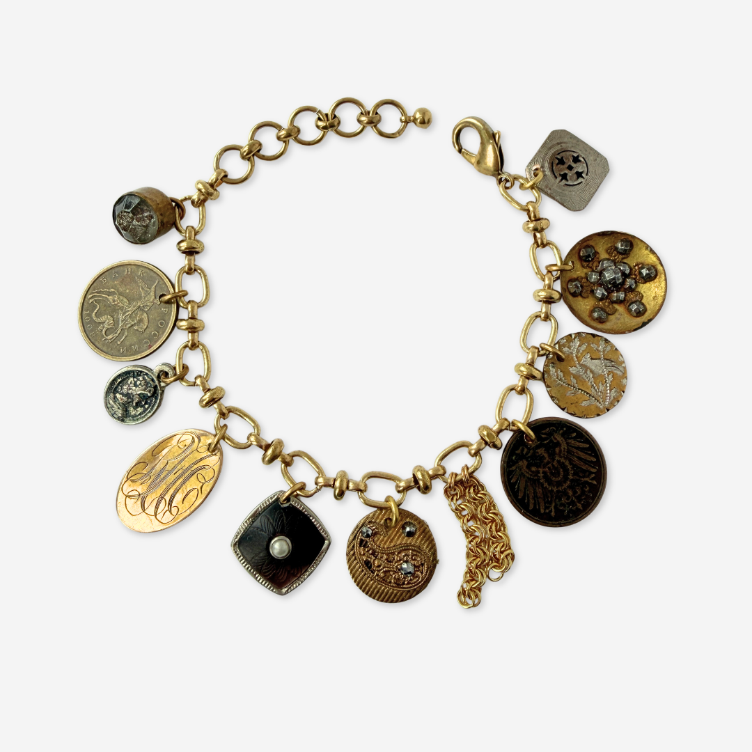Repurposed vintage mixed neutral charm bracelet