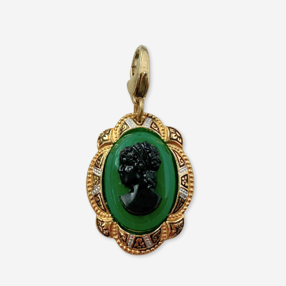 Vintage green and black cameo charm with decorative gold frame