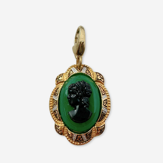 Vintage green and black cameo charm with decorative gold frame