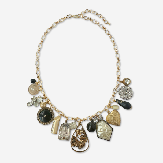 Repurposed vintage neutral charm necklace on gold plated chain