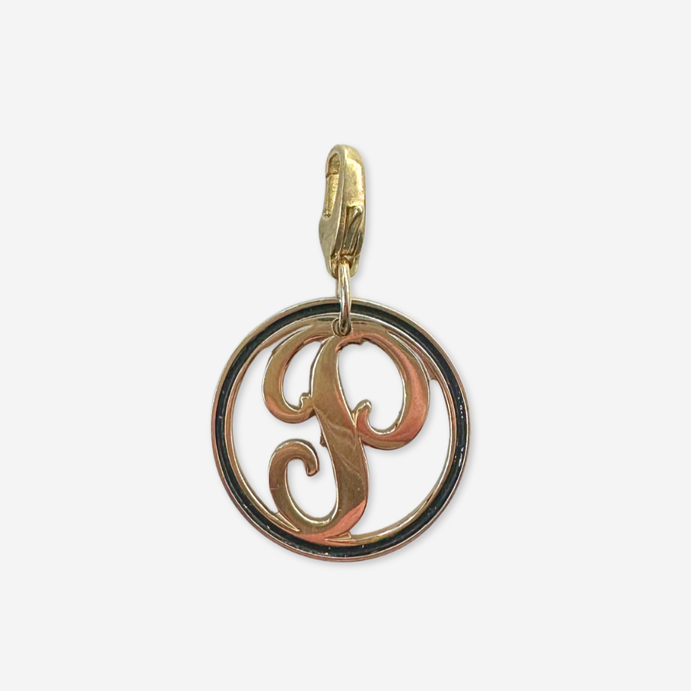 Vintage circular gold and black enamel letter "P" charm