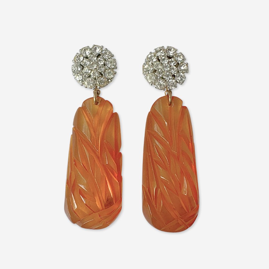 Refashioned vintage orange carved bakelite statement earrings with rhinestone posts