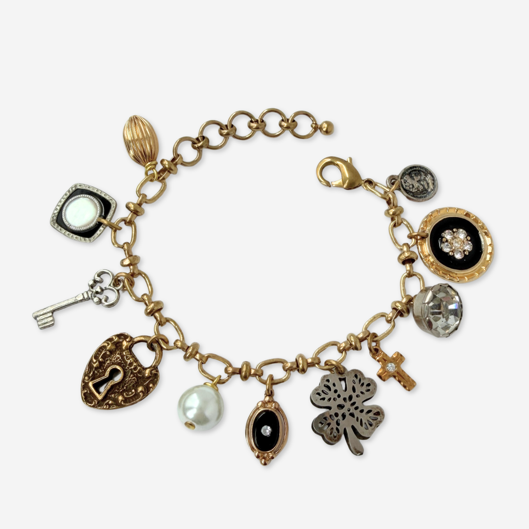 Repurposed vintage mixed neutral charm bracelet