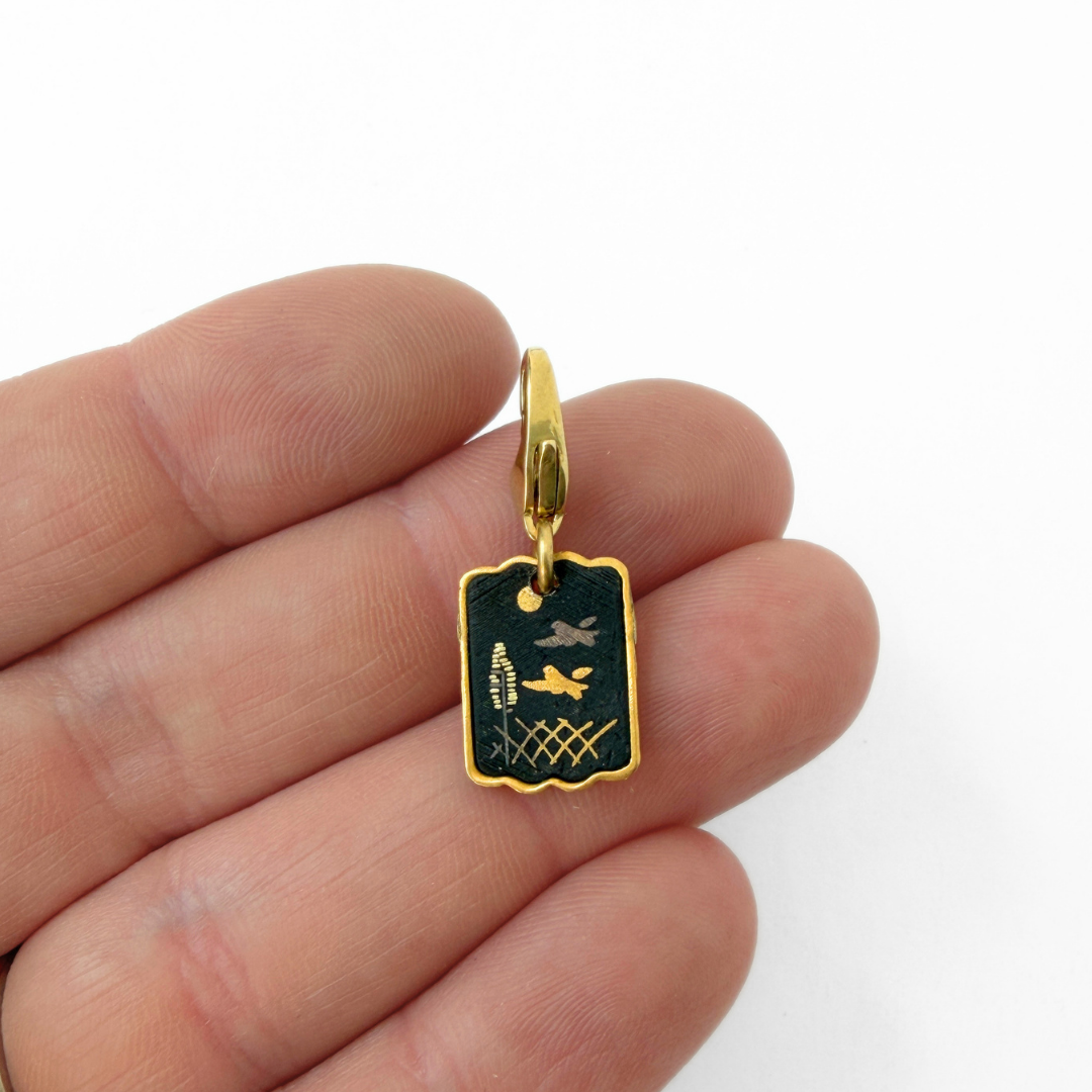 Vintage gold and black small Japanese Damascene bird charm