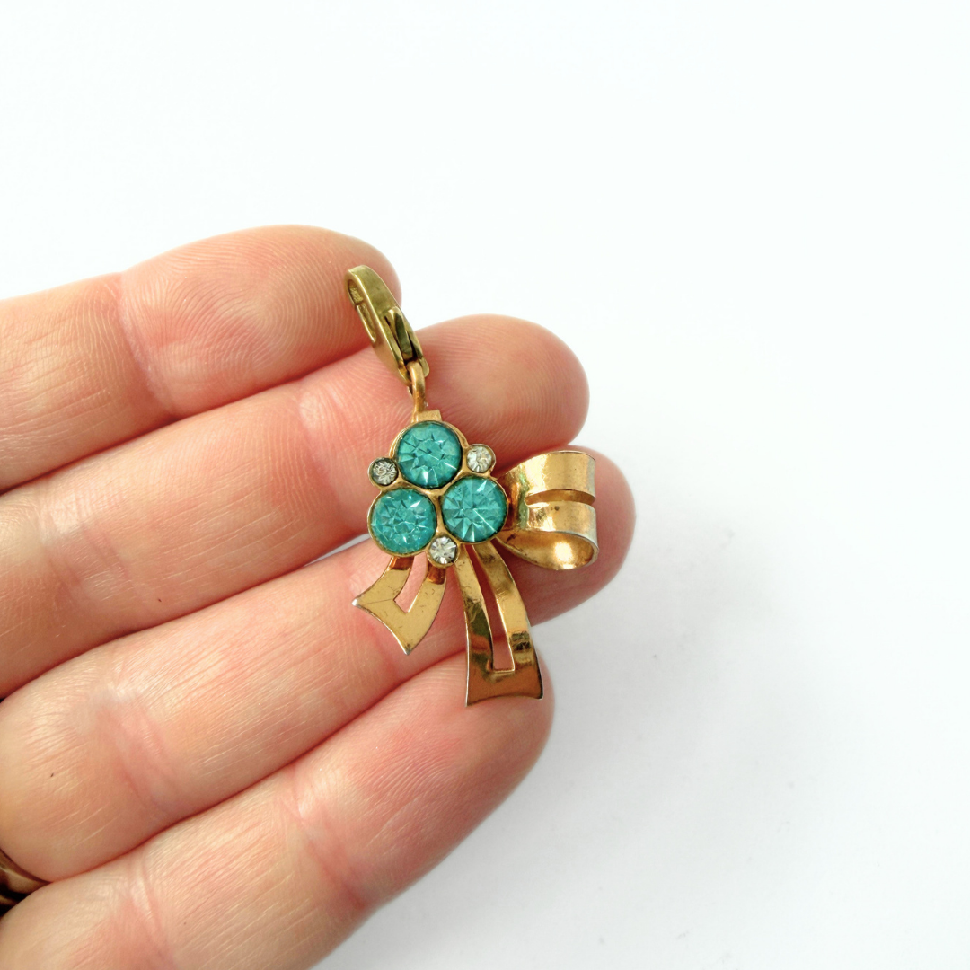 Refashioned vintage gold tone and aqua rhinestone bow charm