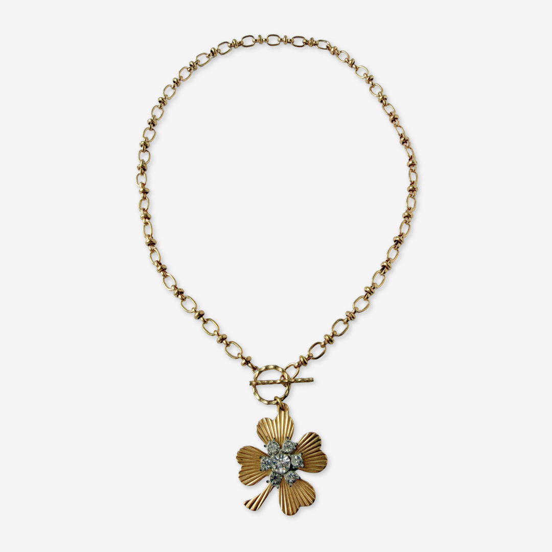Large solid brass four leaf clover pendant with vintage clear rhinestone embellishment