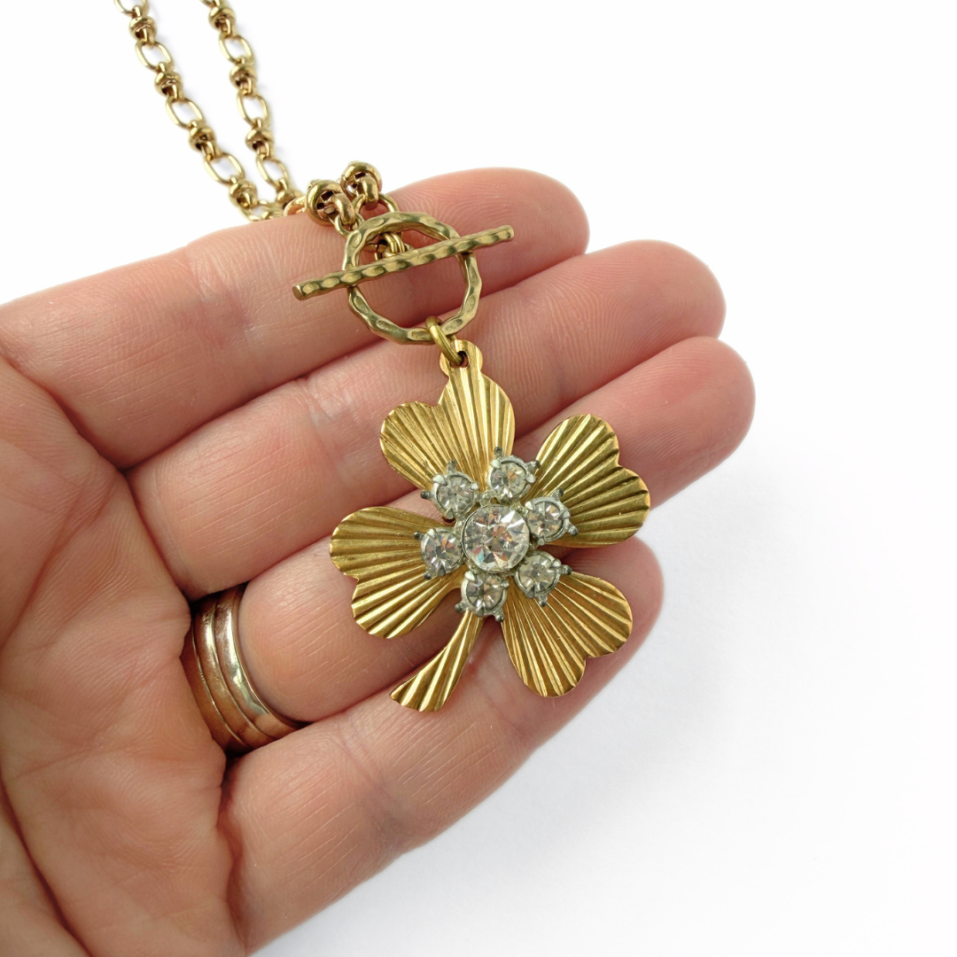 Large solid brass four leaf clover pendant with vintage clear rhinestone embellishment
